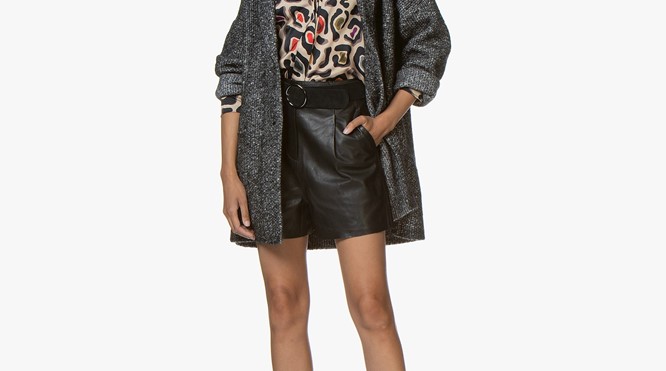 Stylingtip: Draag iets langs over iets korts.